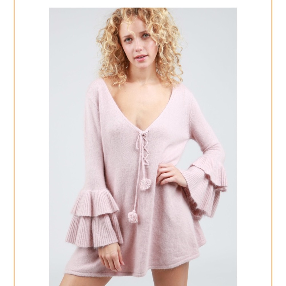 Tiered bell sleeve tunic sweater.